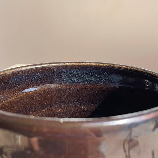 Close-up of a black cup
